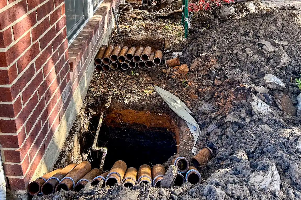Steel pier installation at a foundation repair job