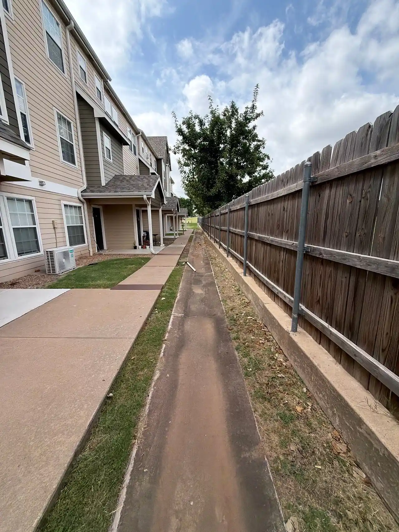 French drain channel installed along a property line