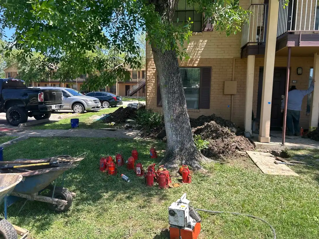 Mudjacking crew and pump at a property
