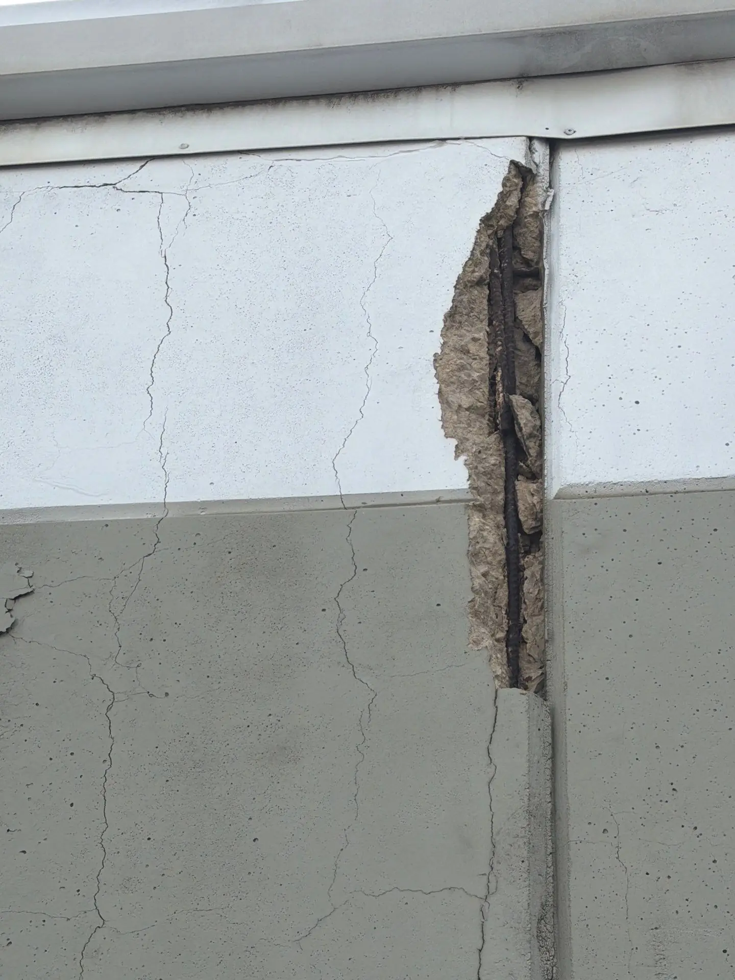 Tilt wall panel joint separation documented during a structural evaluation