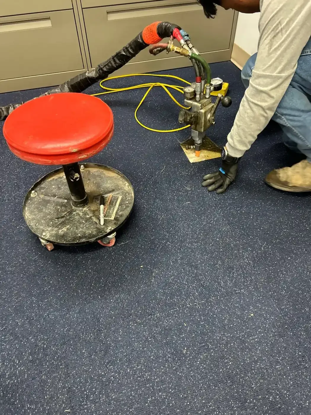 Floor leveling injection work at an industrial facility